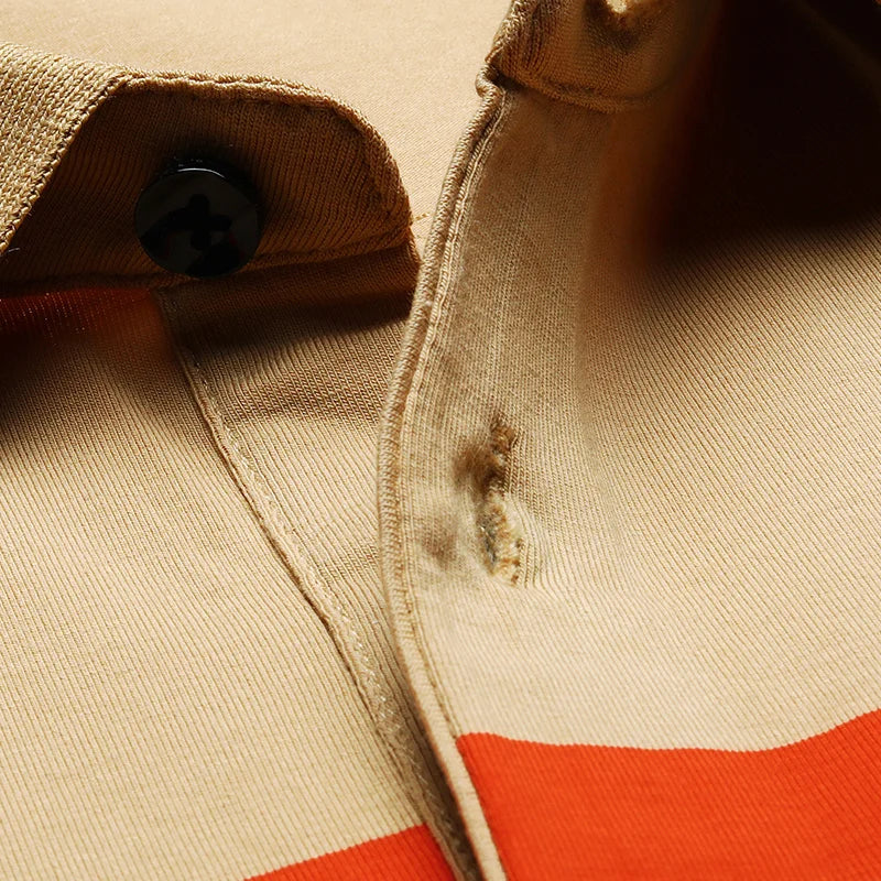 Polo en piqué de coton avec broderie joueur rayé