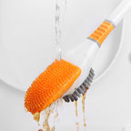 Brosse de toilette forme canard à poils doux à long manche