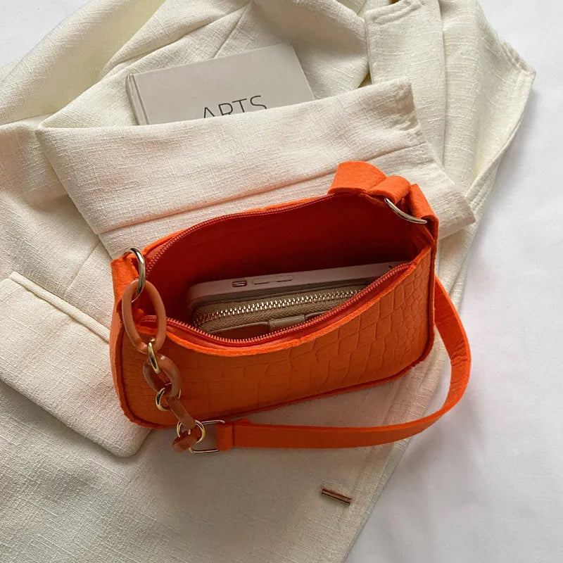 Sac à main en feutre effet croco
